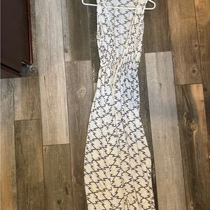 Stylish White and Black Patterned swimsuit coverup